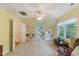 Bright, carpeted bedroom featuring a window seat and built-in bookshelves at 924 Pebblebrook Dr, Raleigh, NC 27609