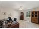 Bedroom featuring neutral walls, carpet, ceiling fan, and wooden storage cabinets at 924 Pebblebrook Dr, Raleigh, NC 27609