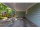 Spacious carport providing ample covered parking, perfect for protecting vehicles from the elements at 924 Pebblebrook Dr, Raleigh, NC 27609