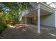 Convenient carport with easy access to the home, blending functionality with a stylish design at 924 Pebblebrook Dr, Raleigh, NC 27609