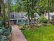 Charming home with well-manicured landscaping and inviting curb appeal, enhanced by mature trees at 924 Pebblebrook Dr, Raleigh, NC 27609