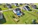 Expansive backyard featuring a swimming pool, fenced garden, and lush green lawn at 104 Bollienger Dr, Princeton, NC 27569