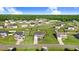 Community aerial shot with beautiful homes and green landscaping at 104 Bollienger Dr, Princeton, NC 27569