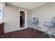 Back deck with seating area and access to the interior of the home at 104 Bollienger Dr, Princeton, NC 27569