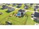 Aerial view of a backyard featuring a swimming pool, garden, and fenced yard at 104 Bollienger Dr, Princeton, NC 27569
