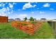 A fenced garden area with raised beds, providing a space for growing plants and vegetables in the backyard at 104 Bollienger Dr, Princeton, NC 27569