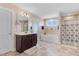 Bathroom featuring double vanity, tile floor, tub, and separate shower at 104 Bollienger Dr, Princeton, NC 27569