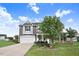Well-maintained two-story home with a two car garage, lush lawn, and a charming front porch at 104 Bollienger Dr, Princeton, NC 27569