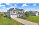 Beautiful two-story home with a welcoming entrance, set in a lush green lawn at 104 Bollienger Dr, Princeton, NC 27569