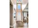 Grand two-story foyer with hardwood floors and lots of natural light showcasing a welcoming entrance at 104 Bollienger Dr, Princeton, NC 27569