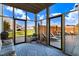 Relaxing screened patio overlooking the backyard and outdoor lounge area at 104 Bollienger Dr, Princeton, NC 27569