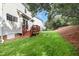 Spacious backyard view with a deck, showcasing the outdoor living space at 109 Troyer Pl, Apex, NC 27502