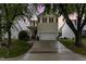Charming two-story home with a manicured lawn and an attached two-car garage at 109 Troyer Pl, Apex, NC 27502