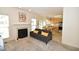 Inviting living room features a cozy fireplace and plenty of natural light at 109 Troyer Pl, Apex, NC 27502
