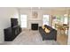Inviting living room features a cozy fireplace and plenty of natural light at 109 Troyer Pl, Apex, NC 27502