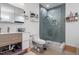This bathroom features a modern walk-in shower with glass and floating vanity at 1115 Sepelo Way, Efland, NC 27243