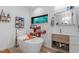 This stylish bathroom showcases a modern soaking tub, floating shelves, and a sleek vanity at 1115 Sepelo Way, Efland, NC 27243