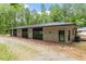 View of the modern home from the side at 1115 Sepelo Way, Efland, NC 27243