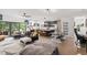Bright and open living space with modern kitchen, dining area, and comfortable seating, perfect for gatherings at 1115 Sepelo Way, Efland, NC 27243