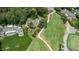 Aerial view of home, golf course, and neighborhood at 112 Lancaster Dr, Chapel Hill, NC 27517