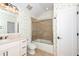 Bathroom featuring a vanity, toilet, tub, and shower combo at 112 Lancaster Dr, Chapel Hill, NC 27517