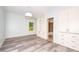 Bedroom featuring a built-in bookcase and access to the bathroom at 112 Lancaster Dr, Chapel Hill, NC 27517