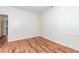 Neutral bedroom with hardwood floors and crisp white trim at 112 Lancaster Dr, Chapel Hill, NC 27517
