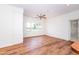 Bright bedroom boasts a ceiling fan and views of the outdoor landscape at 112 Lancaster Dr, Chapel Hill, NC 27517