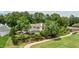 Stunning home with lush landscaping, golf course views, and a backyard patio at 112 Lancaster Dr, Chapel Hill, NC 27517