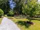 A gravel path leads to a lovely garden, perfect for growing your own fresh produce at 112 Lancaster Dr, Chapel Hill, NC 27517