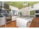 Well-equipped kitchen with stainless steel appliances, granite countertops, and a spacious island at 112 Lancaster Dr, Chapel Hill, NC 27517