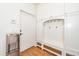 Custom mudroom features built-in storage, hooks, and a convenient water dispenser at 112 Lancaster Dr, Chapel Hill, NC 27517