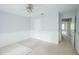 Bedroom with chair rail, carpeted floors, and ceiling fan at 115 Abingdon Ct # 2B, Cary, NC 27513