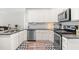 Well-equipped kitchen with modern stainless steel appliances and granite countertops at 115 Jensen Dr, Wendell, NC 27591