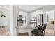 Stylish kitchen featuring a granite island with seating and stainless steel appliances at 115 Jensen Dr, Wendell, NC 27591