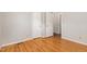 Comfortable bedroom with hardwood floors and ample closet space, perfect for relaxation and storage at 1304 Park Ave, Dunn, NC 28334