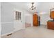 The kitchen has stainless steel appliances, tile floors, and neutral-tone walls at 1304 Park Ave, Dunn, NC 28334