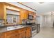 Updated kitchen showcasing stainless appliances, ample counter space and an open design to the living area at 1304 Park Ave, Dunn, NC 28334