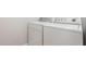 The image showcases a white washer and dryer at 1304 Park Ave, Dunn, NC 28334