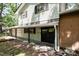 Charming front porch with black accents and beautifully landscaped surroundings at 134 Chateau Rd, Durham, NC 27704