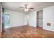 Spacious bedroom features hardwood floors, ceiling fan, two closets, and attached bathroom at 134 Chateau Rd, Durham, NC 27704