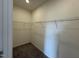 Walk-in closet features built-in wire shelving for efficient storage solutions at 136 Bruce Dr Dr, Dunn, NC 28334