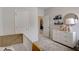 A neutral tone Bedroom features a crib with a decorative dresser, ideal for a serene start at 144 Bruce Dr, Dunn, NC 28334