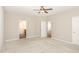 Spacious primary bedroom with neutral carpet and en-suite bathroom access at 157 Willow Grove Ln, Fuquay Varina, NC 27526