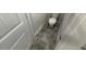 This bathroom includes a toilet and tile flooring at 16 Freedom Heights Ln, Smithfield, NC 27577