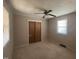 Bedroom with a window, closet, and carpeted floor at 1704 Southgate St, Durham, NC 27703