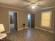 Bedroom with wood laminate flooring, ceiling fan, and natural light from the windows at 1704 Southgate St, Durham, NC 27703