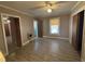 Bedroom featuring a ceiling fan and window offering natural light at 1704 Southgate St, Durham, NC 27703