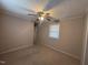 Bedroom featuring a ceiling fan and window with natural light at 1704 Southgate St, Durham, NC 27703