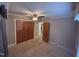 Bedroom with a window, closet, and carpeted floor at 1704 Southgate St, Durham, NC 27703